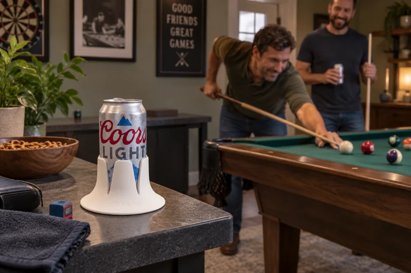 Adult friends pausing between shots at home pool table with opened beer can in Steadi on wide level billiards-room side counter away from playing surface and cue swing. AI illustration.